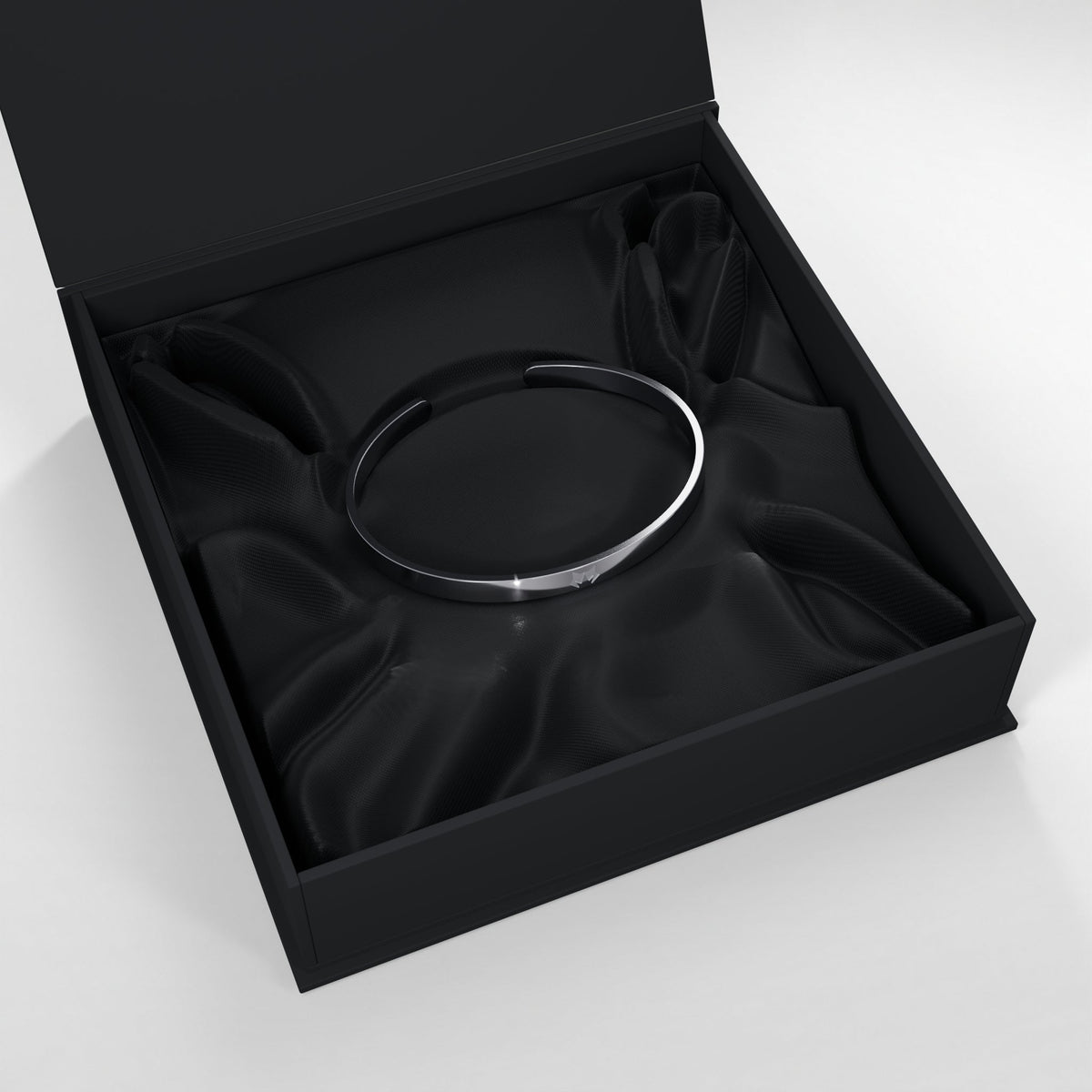 Silver bracelet in the open HOWL presentation box