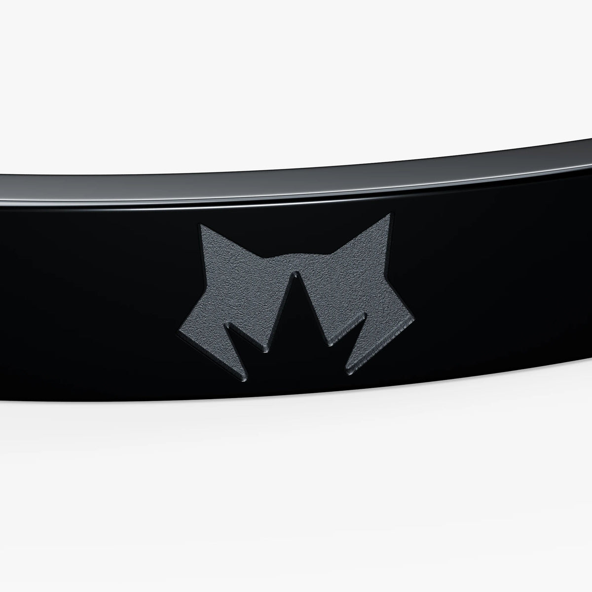 Black bracelet, wolf engraving detail