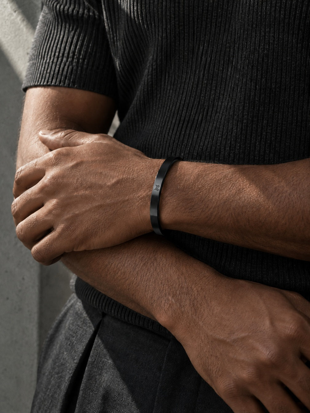 Black Signature Cuff worn on the wrist