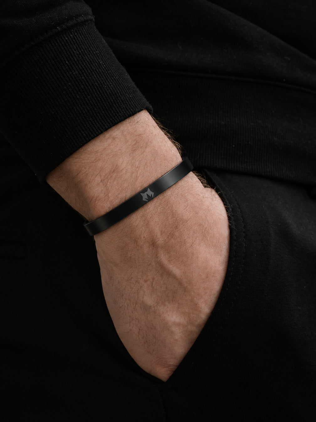 Black Signature Cuff worn on the wrist